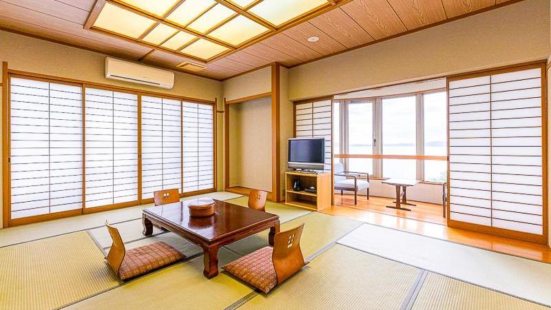 Готель Unzen Obama Onsen Juraku Екстер'єр фото